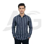 Front view of a man wearing a men's navy blue and light blue vertical striped long-sleeve button-down shirt