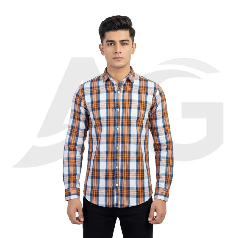 Front view of a man wearing a casual orange, blue, and white plaid long-sleeve button-down shirt paired with black jeans.