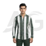 A man modeling a brown, black, and white checkered long-sleeve button-down shirt worn open over a white t-shirt.
