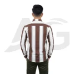 Back view of a men's brown and white vertical striped long-sleeve shirt showcasing a structured solid brown shoulder yoke.