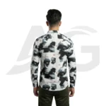 Back view of a man modeling a white and black abstract print shirt with typography, showing the continuous graphic pattern and shoulder fit.