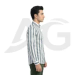 Right side profile view of a man wearing a white and blue striped long-sleeve shirt, showcasing the tailored sleeve fit and smoothly curved hemline.
