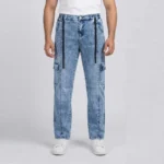 Male model wearing men's light blue acid wash denim cargo pants featuring a front vertical seam, side utility pockets, and a black drawstring.