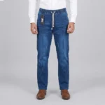 Dark blue denim cargo pants held up in a store, displaying the front drawstring, distressed accents, and side pockets.