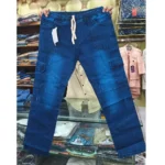Dark blue denim cargo pants held up in a clothing store, showing the front white drawstring waist, distressed accents, and side pockets.