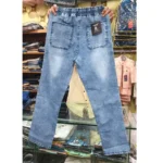Back view of men's light blue denim pants held up in a store setting, showing the elastic waist and dual rear pockets.