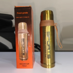 Gold stainless steel insulated thermos 750ml with tan carry strap