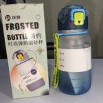 Navy blue frosted 720ml water bottle with pop-up straw lid and carry strap