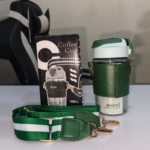 570ml green glass water bottle with protective sleeve and adjustable strap