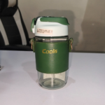 570ml green glass water bottle with protective sleeve and adjustable strap