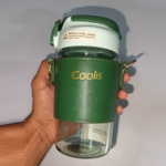 570ml green glass water bottle with protective sleeve and adjustable strap